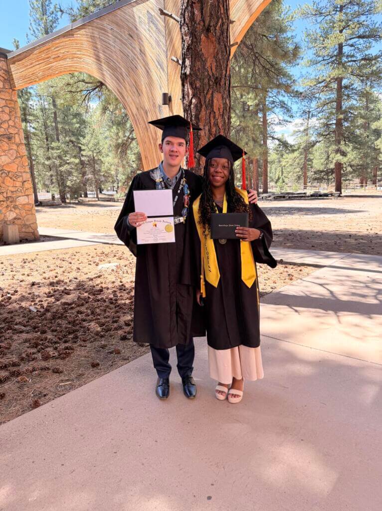 Lucas, as student at GCPA poses at graduation.