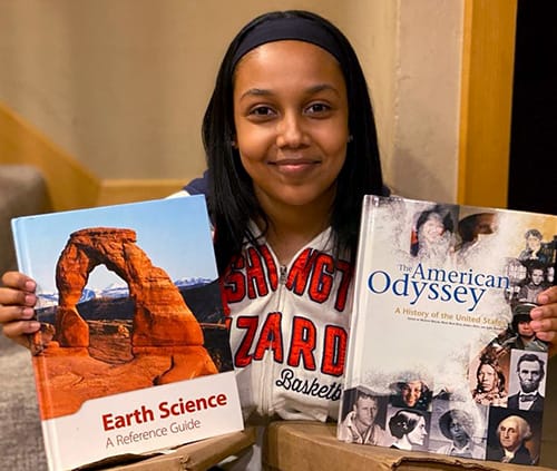 Girl with history and science books