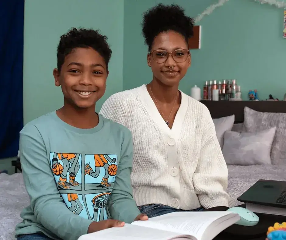 Mother and son smiling