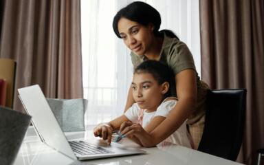 Mother & daughter in class at a flexible online school